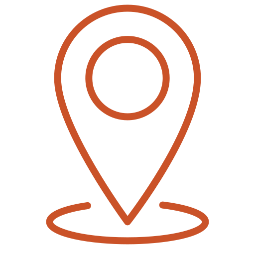 A simple line art illustration of a map pin icon, colored in an orange, stands against a transparent background. The icon has a circle at the top and a pointed bottom, with a smaller oval at its base.